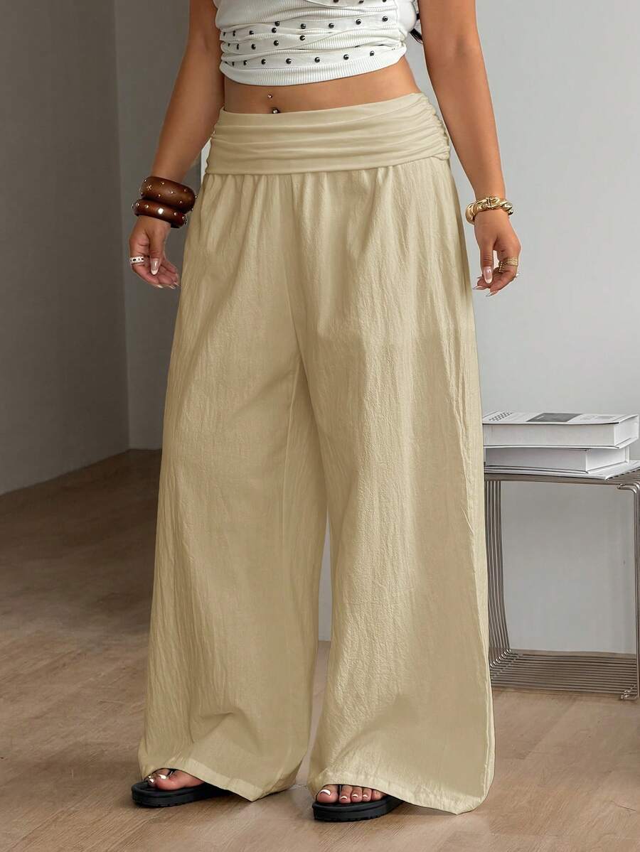 Apricot plus size wide leg pants made of 100% cotton with a high waist and relaxed loose fit.