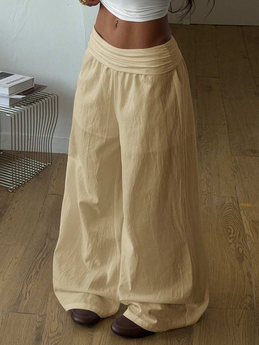 Apricot plus size wide leg pants made of 100% cotton with a high waist and relaxed loose fit.
