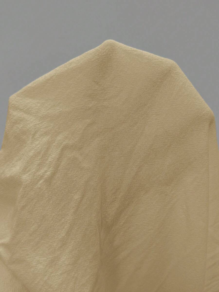 Apricot plus size wide leg pants made of 100% cotton with a high waist and relaxed loose fit.