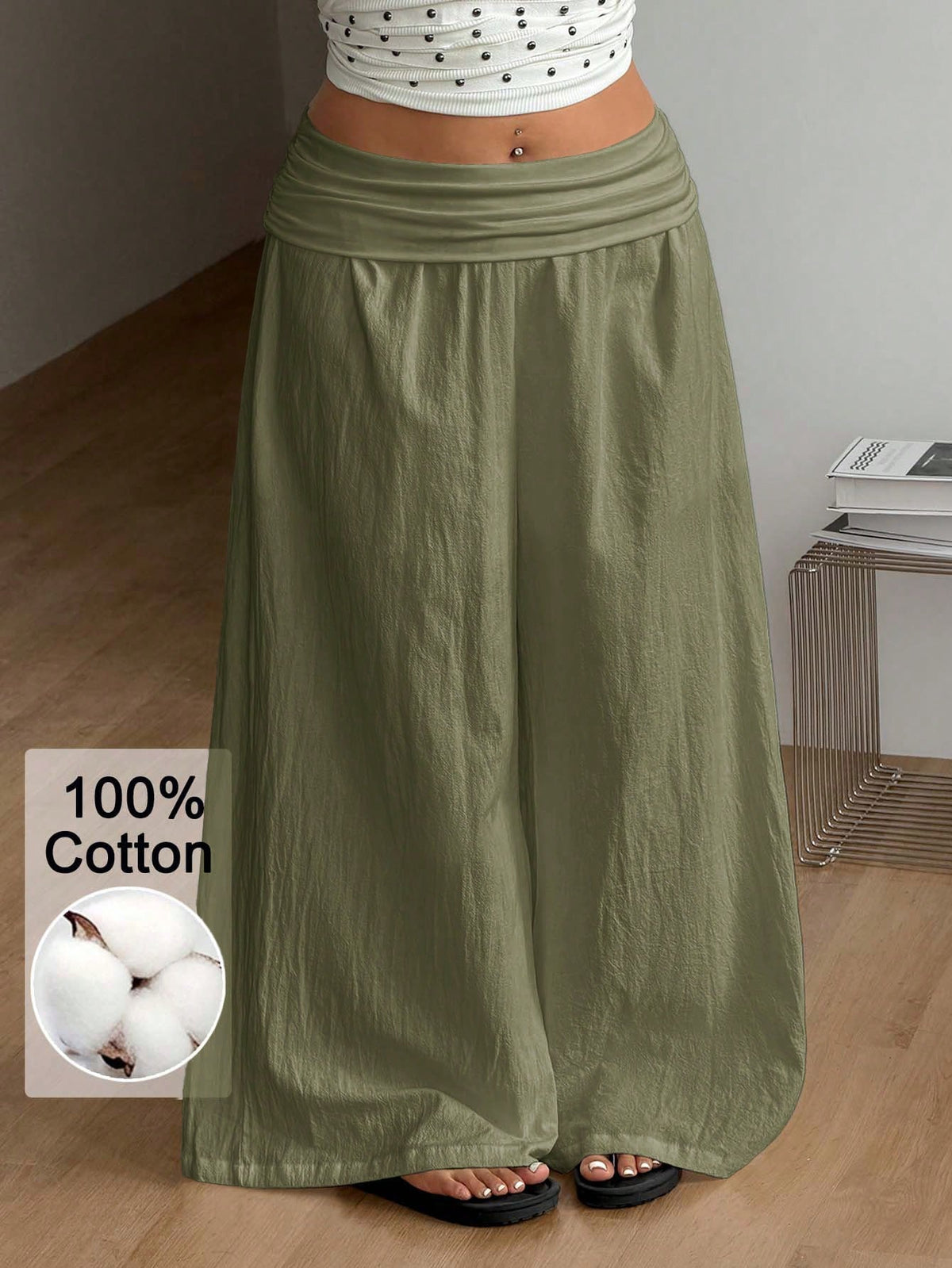 Women's plus size wide leg cotton pants featuring a relaxed loose fit and high waist design.