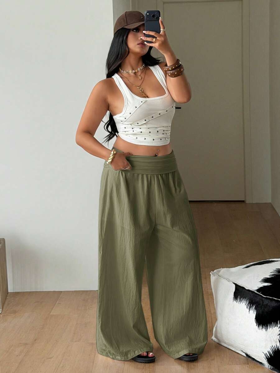 Women's plus size wide leg cotton pants featuring a relaxed loose fit and high waist design.