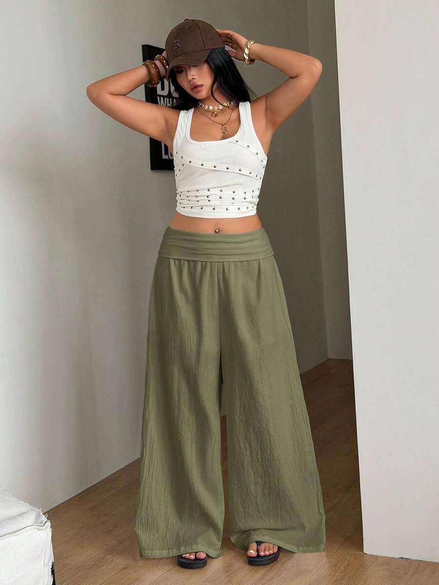 Women's plus size wide leg cotton pants featuring a relaxed loose fit and high waist design.