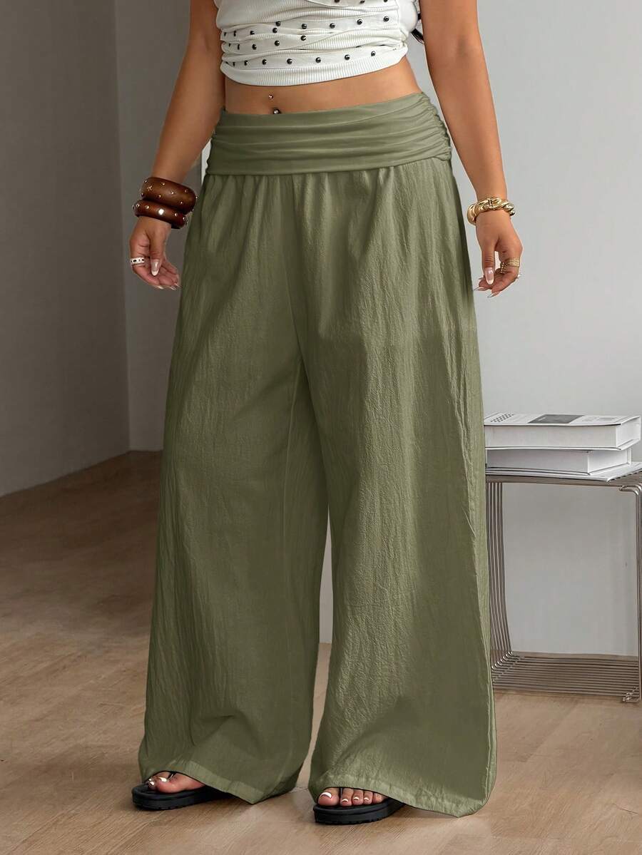 Women's plus size wide leg cotton pants featuring a relaxed loose fit and high waist design.