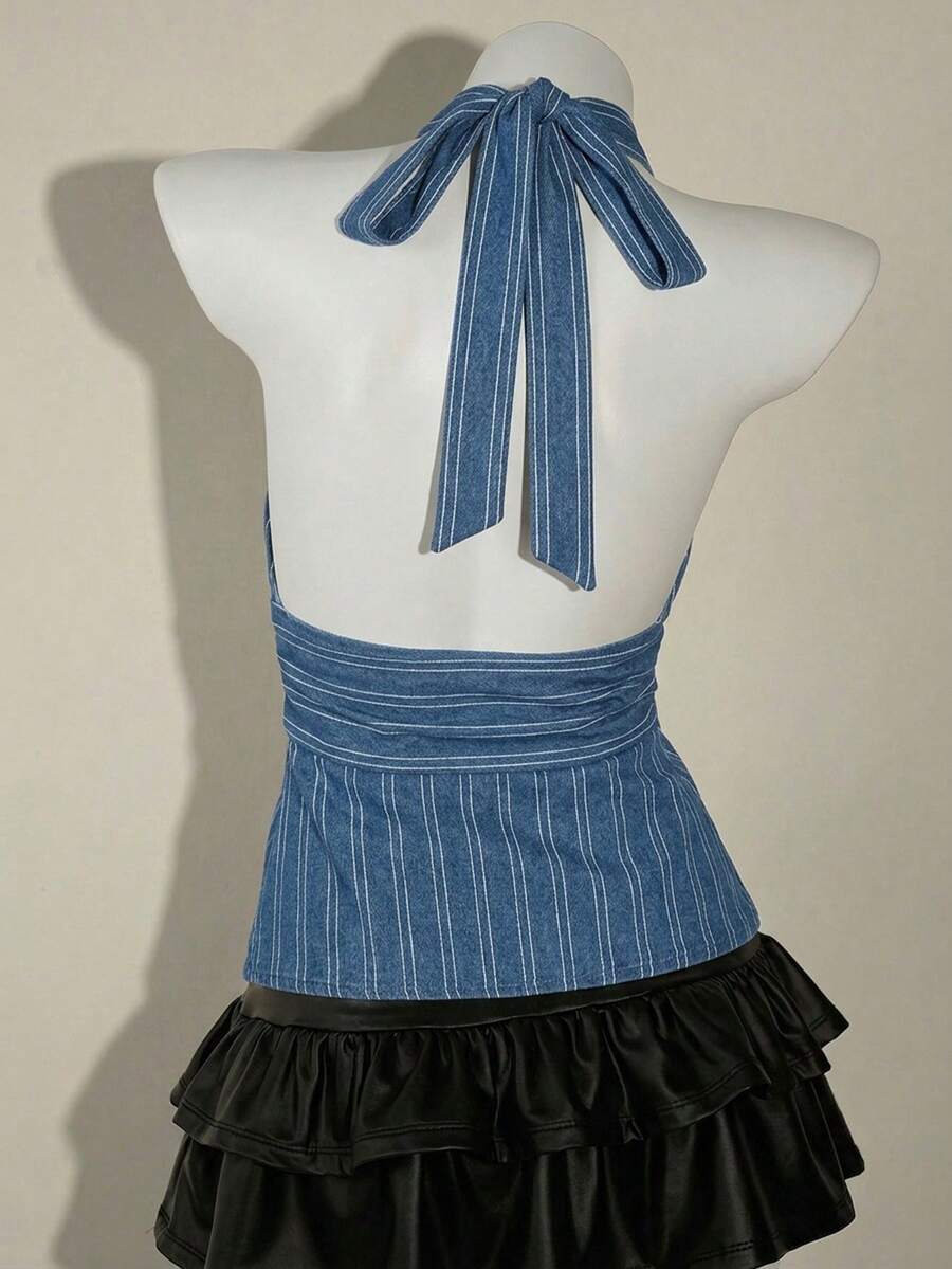 White women's deep V-neck halter tank top with ruched waist, backless design, rib-knit texture, and ruffle hem