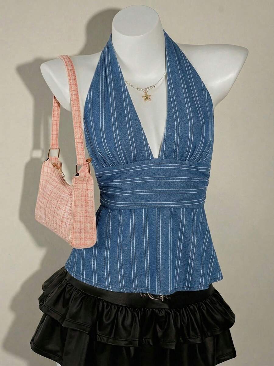 White women's deep V-neck halter tank top with ruched waist, backless design, rib-knit texture, and ruffle hem