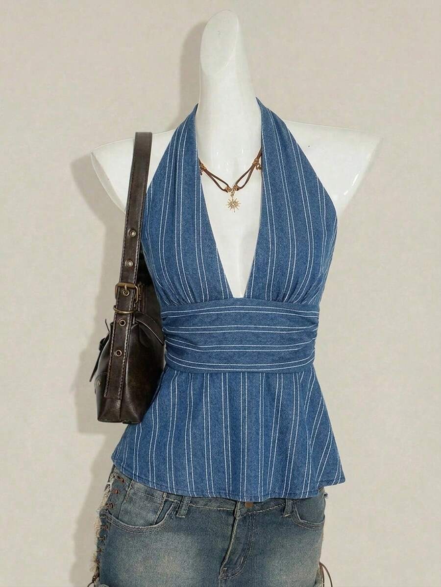White women's deep V-neck halter tank top with ruched waist, backless design, rib-knit texture, and ruffle hem