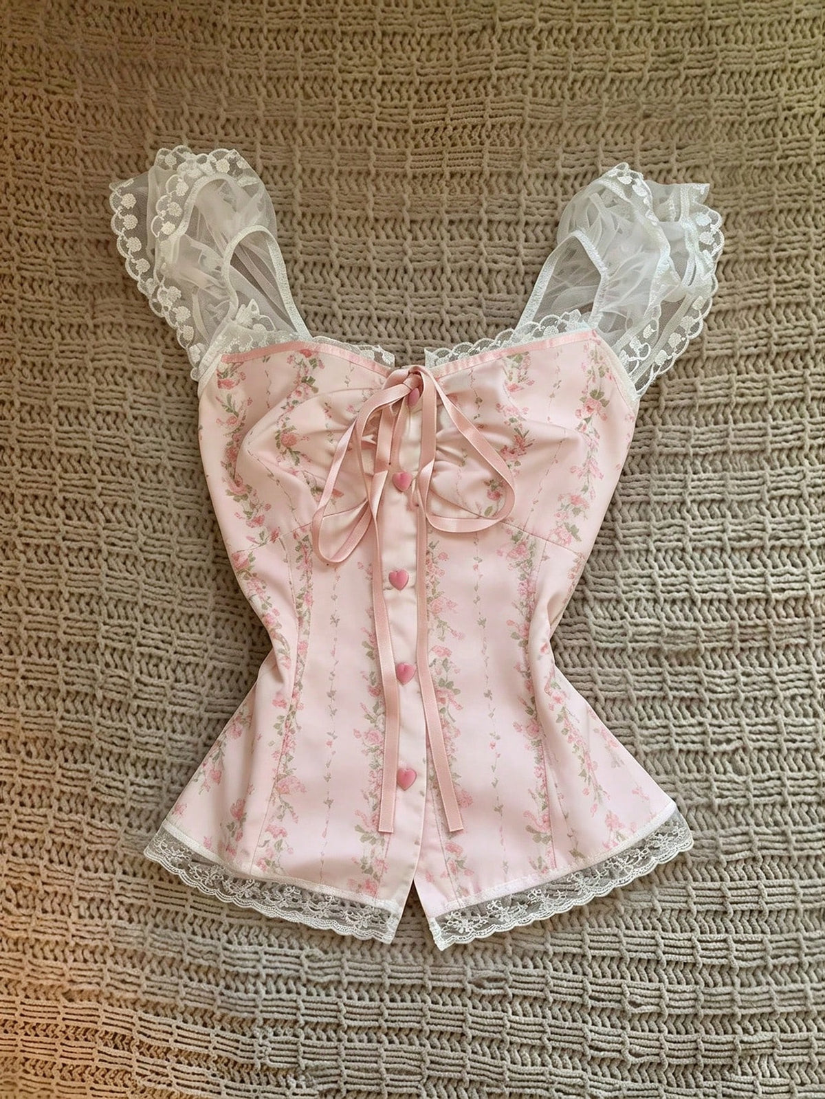 Vintage ditsy floral print sleeveless women's blouse with square neck, ruffle trim, and slim fit style.
