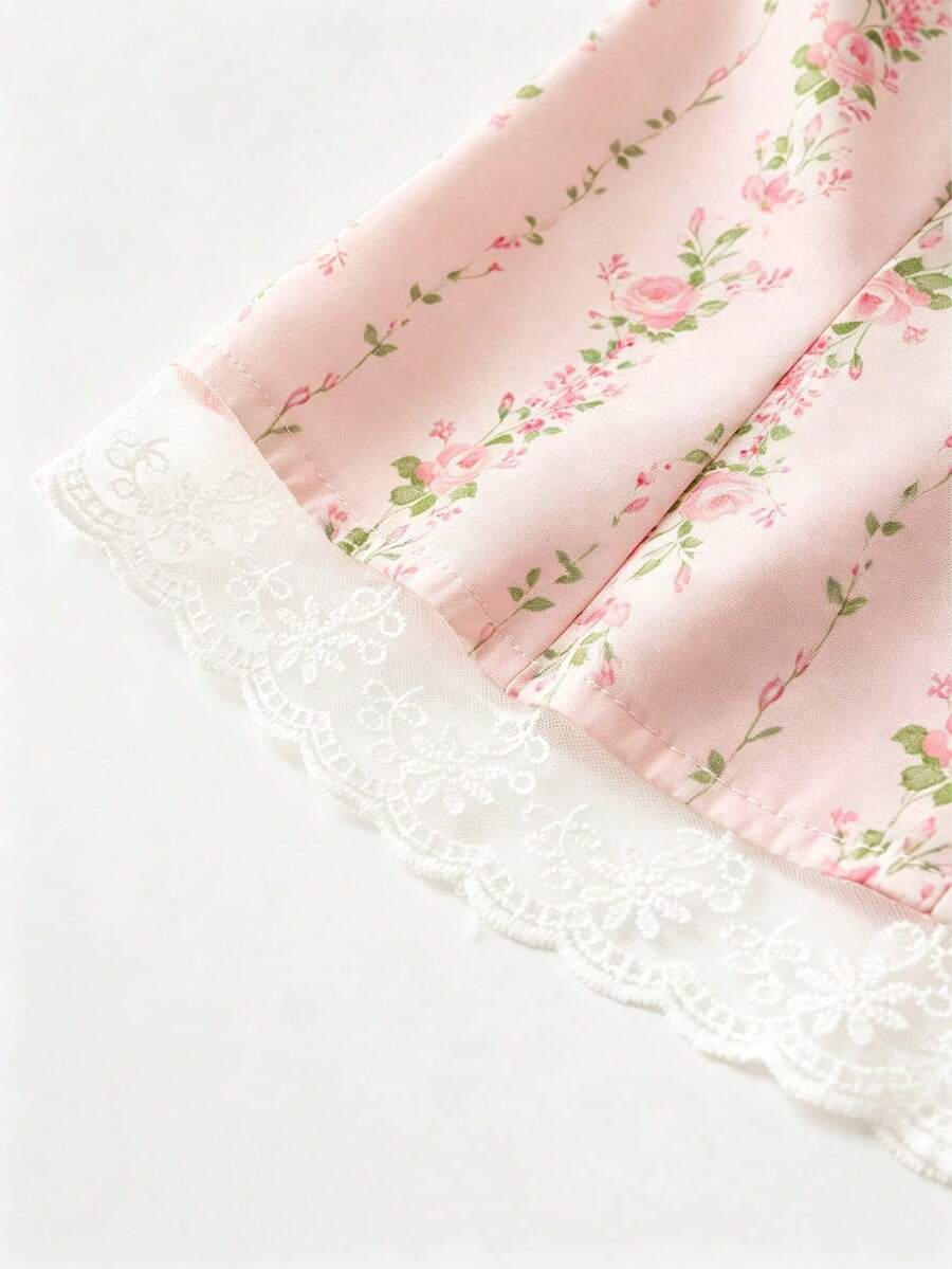 Vintage ditsy floral print sleeveless women's blouse with square neck, ruffle trim, and slim fit style.
