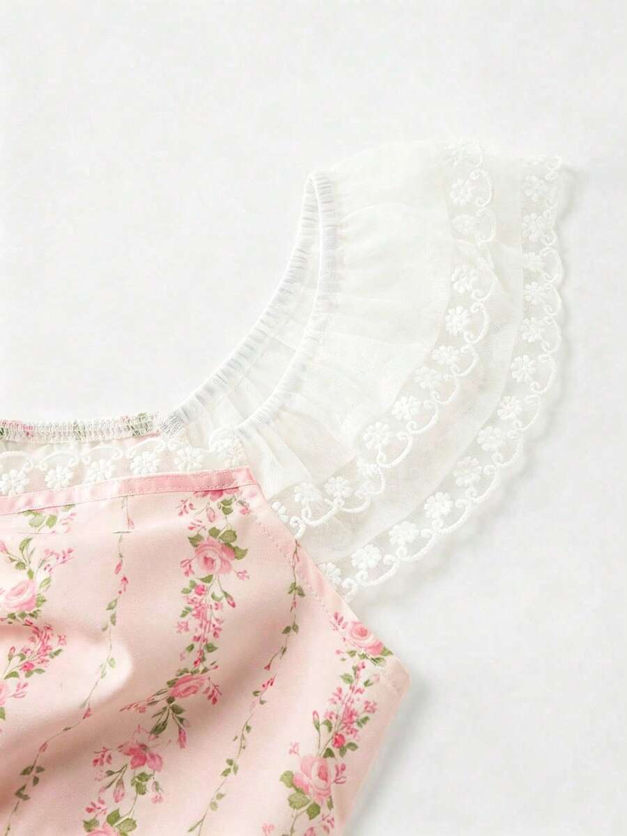 Vintage ditsy floral print sleeveless women's blouse with square neck, ruffle trim, and slim fit style.