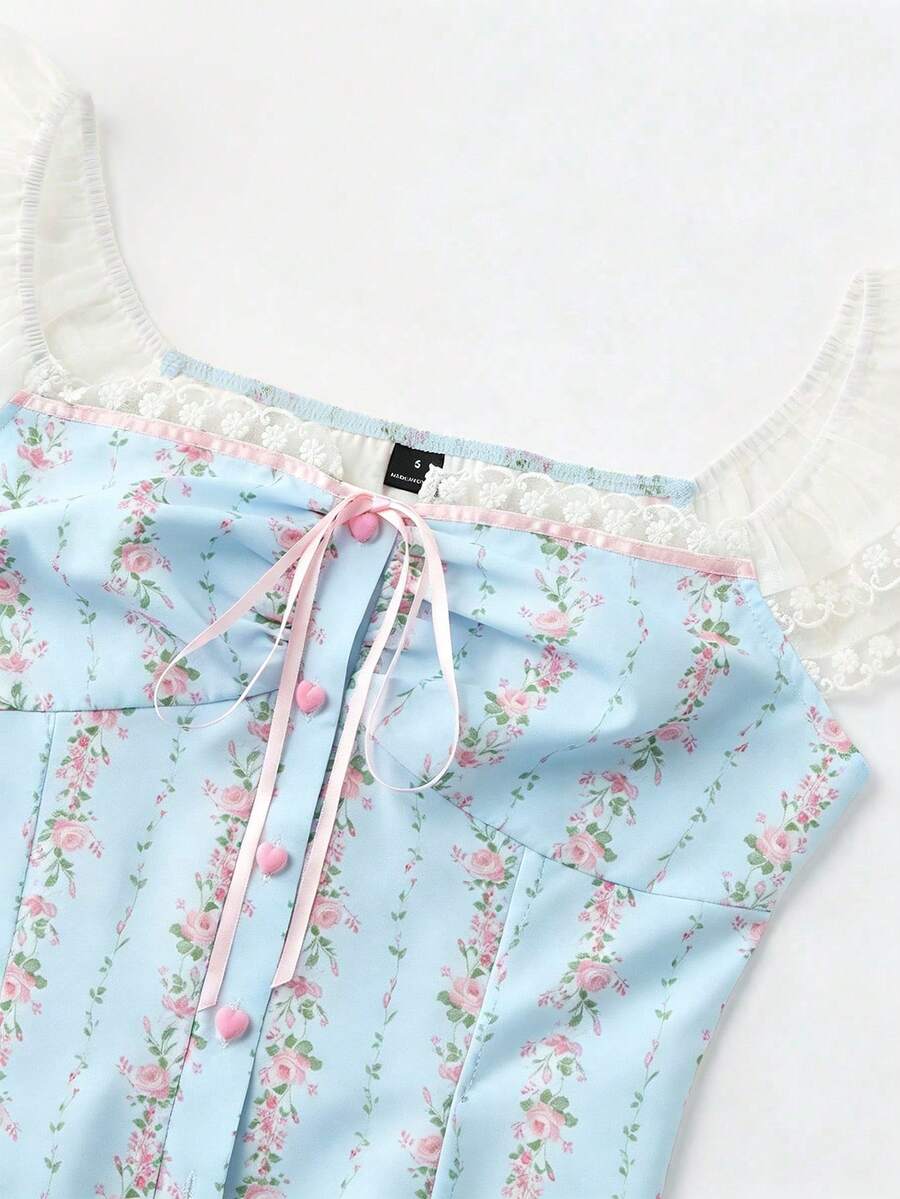Vintage ditsy floral print sleeveless women's blouse with square neck, ruffle trim, and slim fit style.