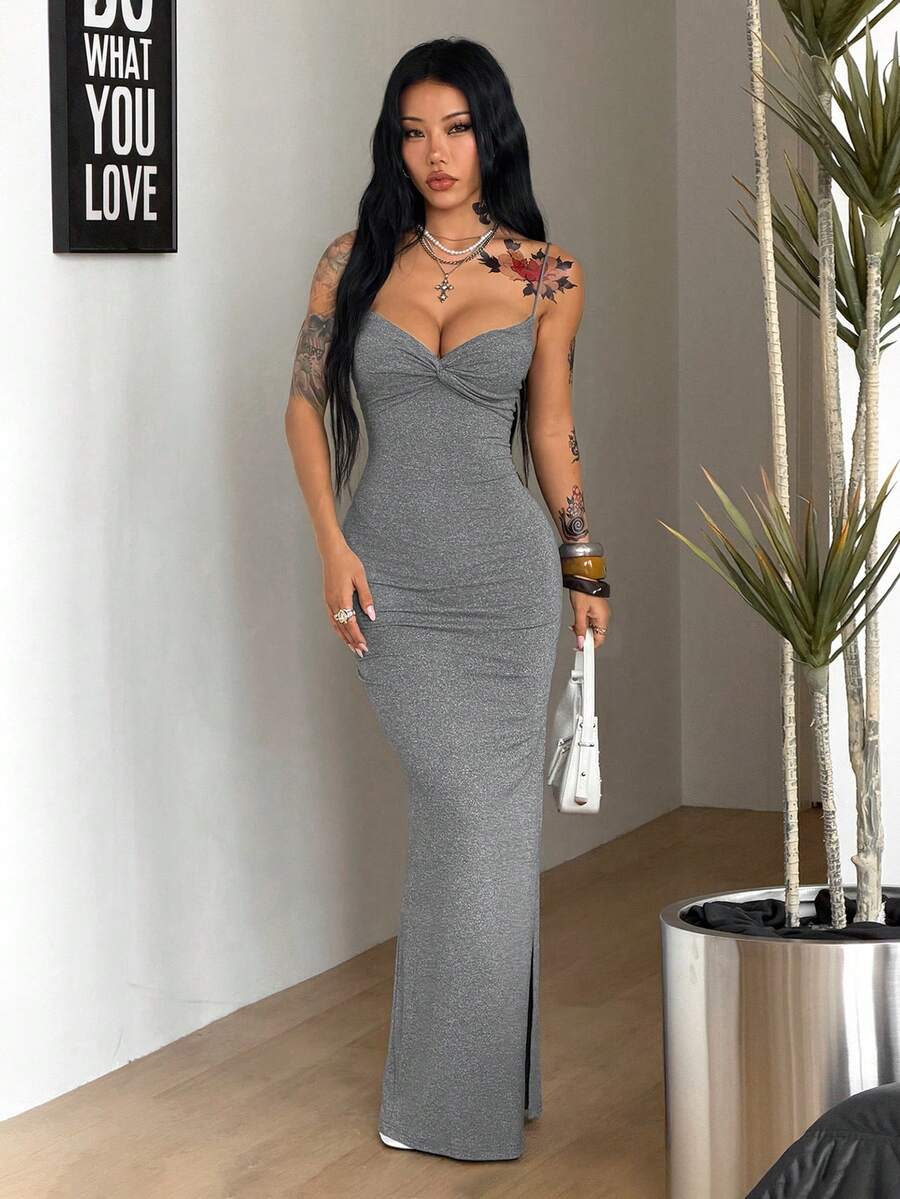 Women's backless cami midi dress in dark grey knit fabric featuring spaghetti straps, lace-up back design, and a split thigh slit.
