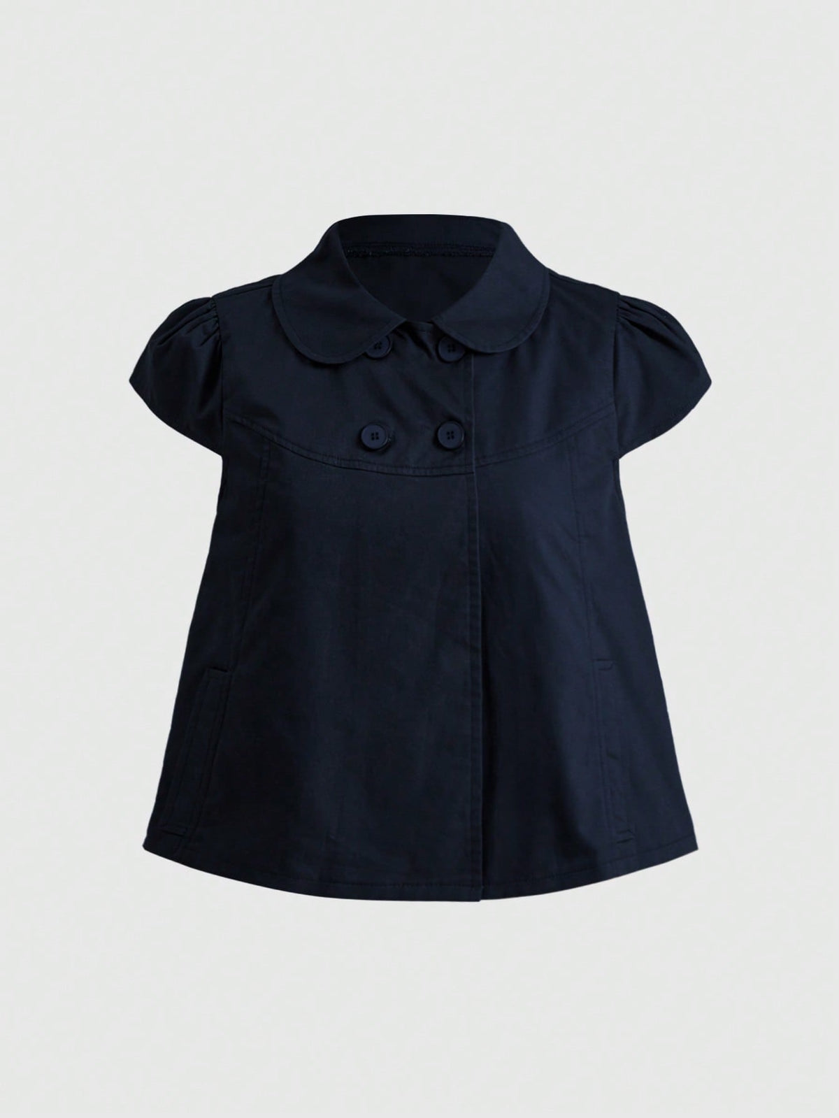 Women's short puff sleeve cotton blouse featuring a Peter Pan collar, double button detail, and front pocket.