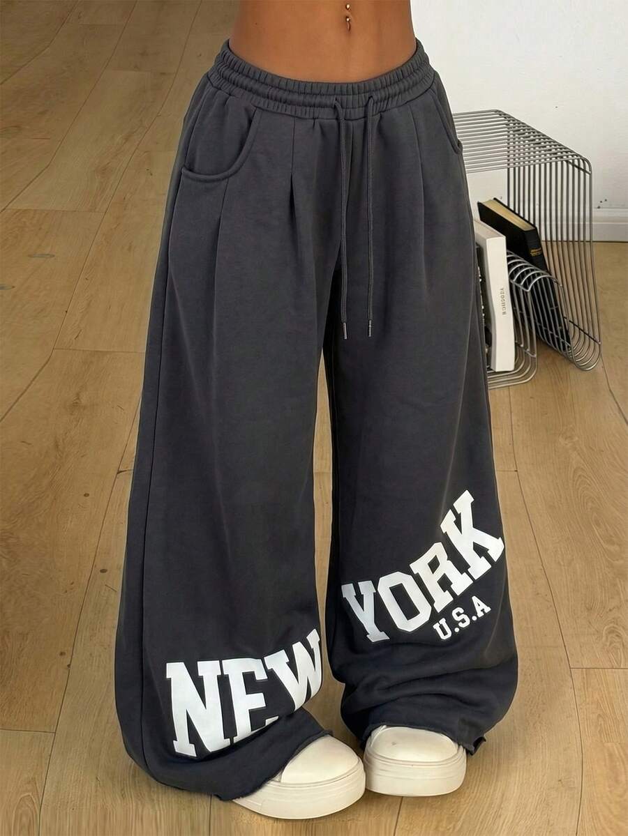 Women's loose straight leg casual pants with drawstring elastic waist and pockets