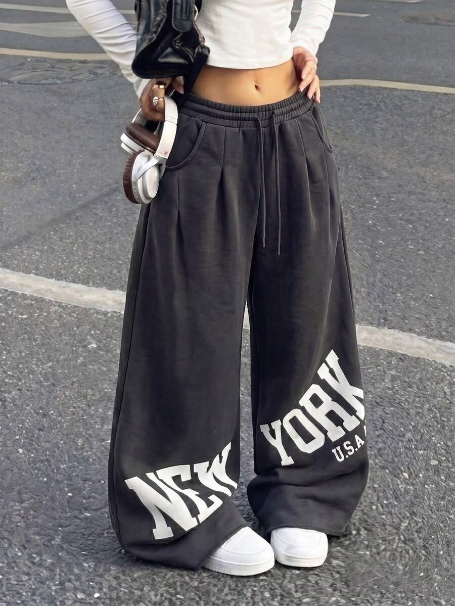 Women's loose straight leg casual pants with drawstring elastic waist and pockets