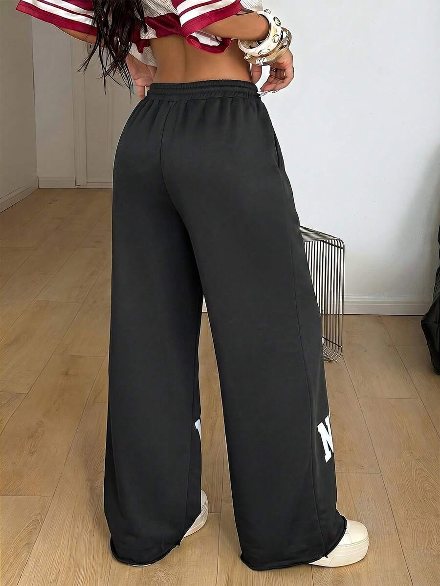 Women's loose straight leg casual pants with drawstring elastic waist and pockets