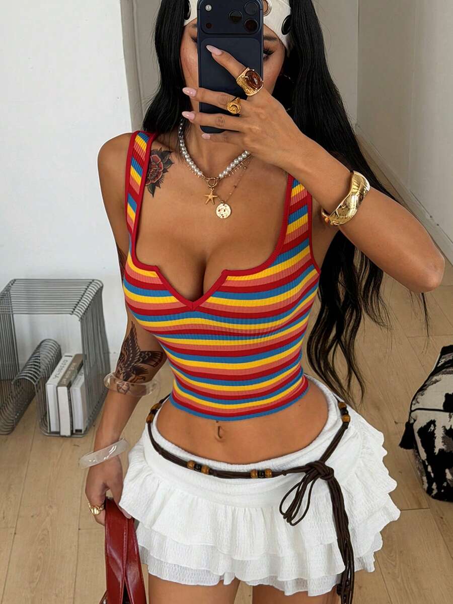 Women's striped rib-knit crop tank top with a notched neckline and slim fit.