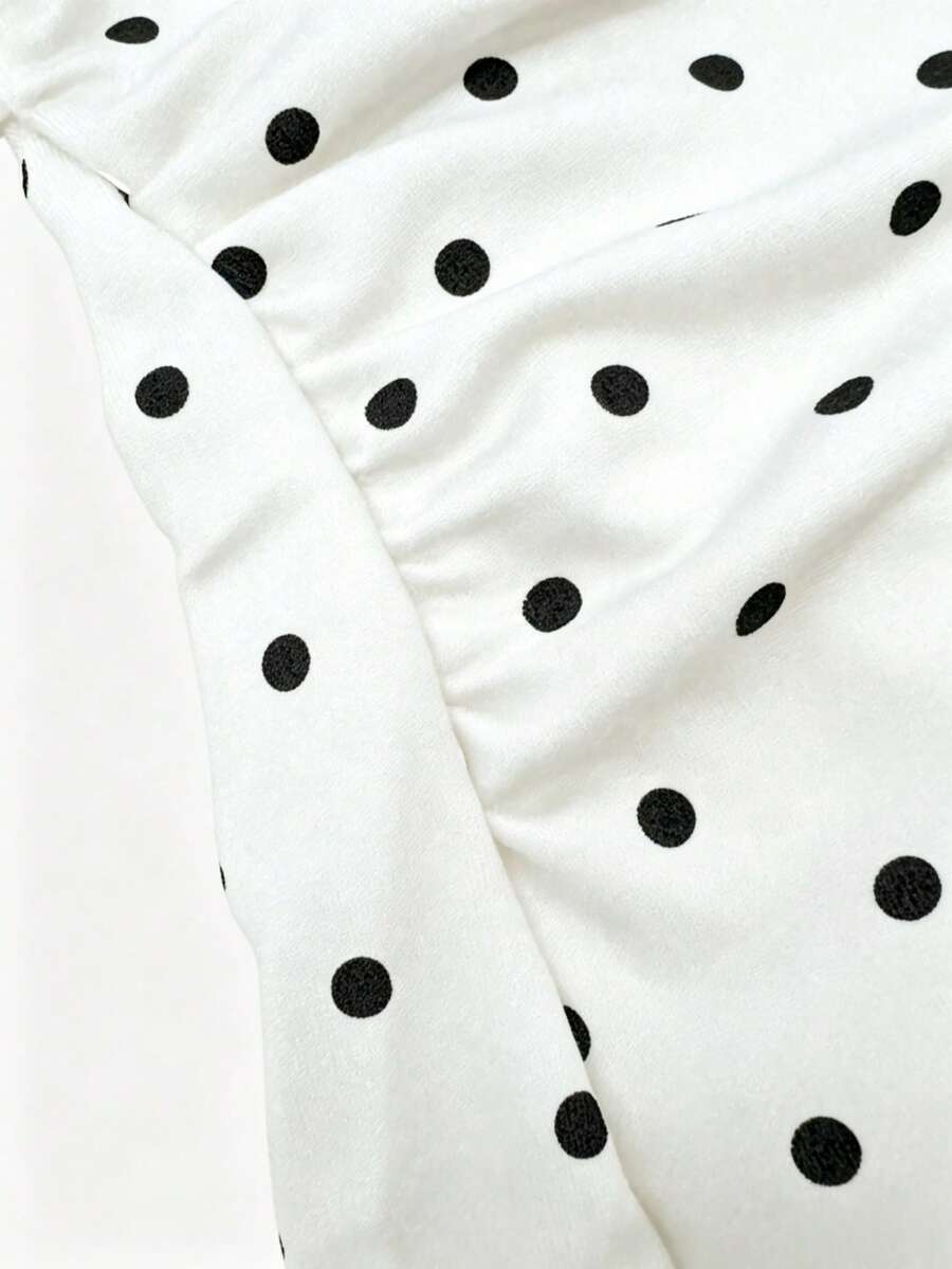 Women's cowl neck tie polka dot pleated tank blouse with ruched details and a regular fit