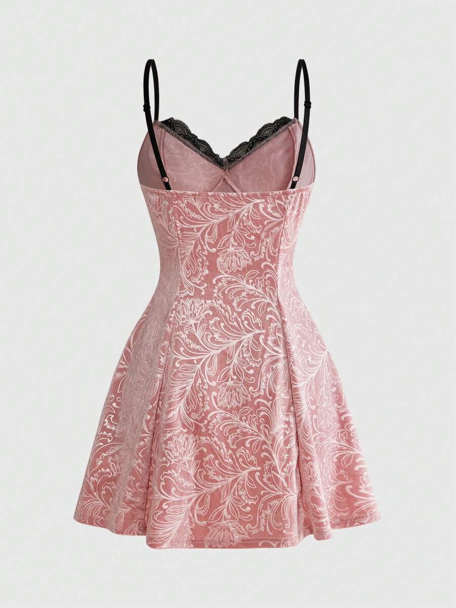 Plus size velvet slip dress featuring delicate contrast lace trim, spaghetti straps, and flared mini skirt with matching arm sleeves.