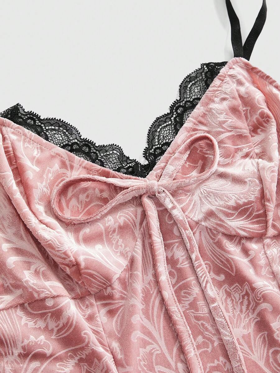 Plus size velvet slip dress featuring delicate contrast lace trim, spaghetti straps, and flared mini skirt with matching arm sleeves.