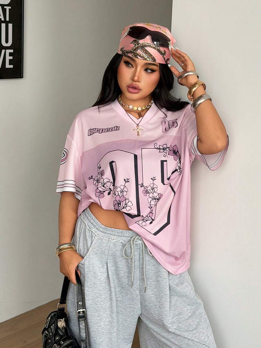 Navy blue plus size mesh baseball jersey t-shirt featuring a V-neck, raglan half sleeves, and sporty letter detailing.