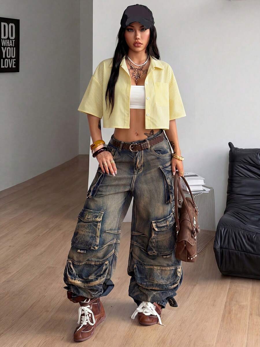 Women's plaid crop shirt with button front, chest pocket, short sleeves, and loose casual fit.