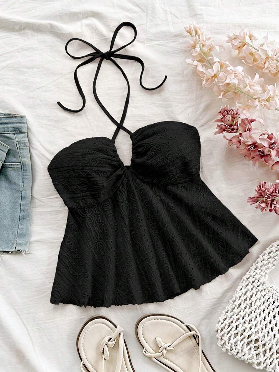 Women's textured V-neck halter tank top with backless knot detail, ruffle hem, and flared silhouette for casual beach and vacation wear.