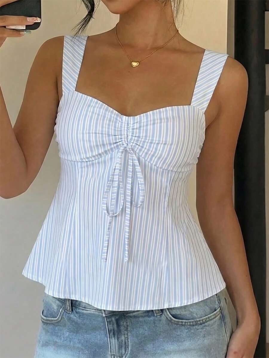 Women's striped camisole tank top with strap neckline, backless knot detail, cold shoulder styling, slim fit, and flared hem for casual vacation or daily wear.