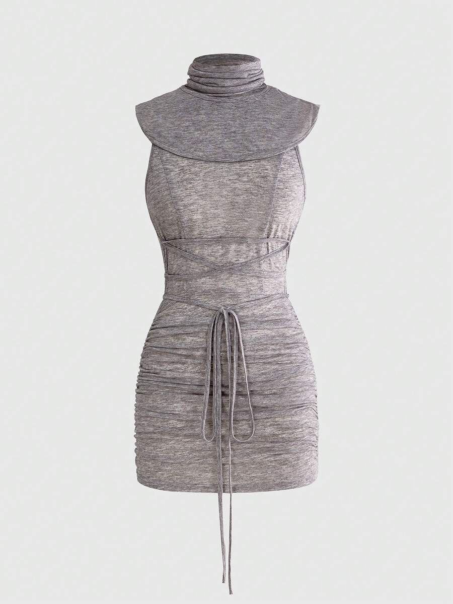 Front view of a sleeveless hooded cowl neck bodycon mini dress with draped collar detailing in knitted fabric.
