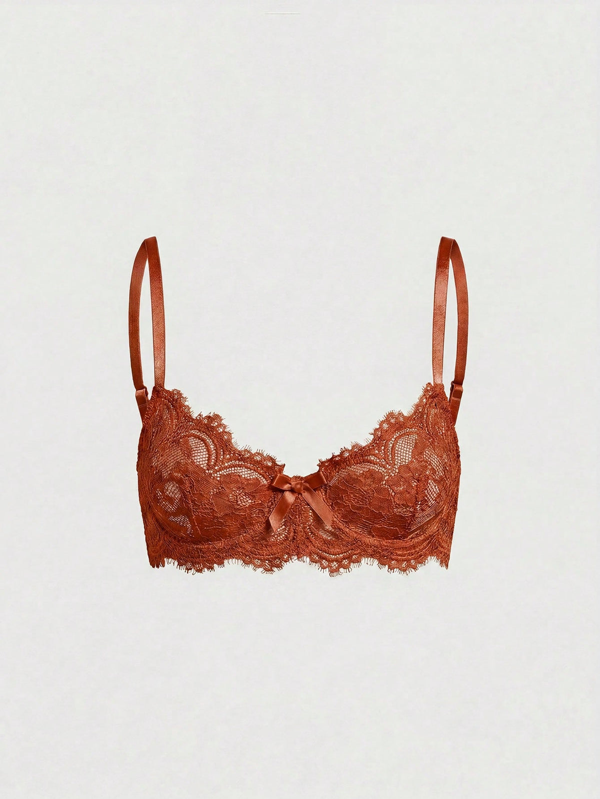 Sheer floral lace underwire triangle bra for women featuring adjustable straps and plunge cup design.