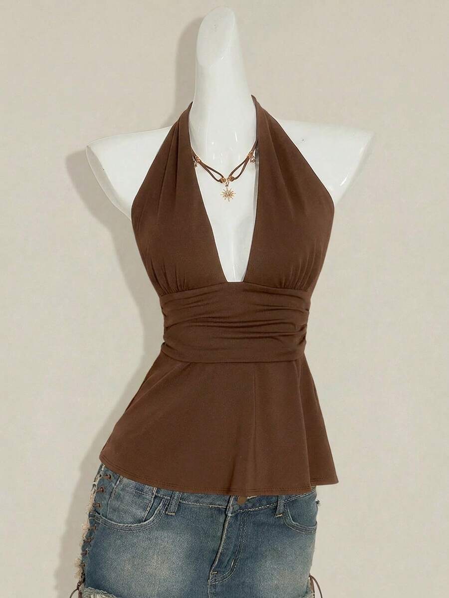 Women's backless halter babydoll tank top featuring a square neckline, slim fit silhouette, and a flared ruffle hem.