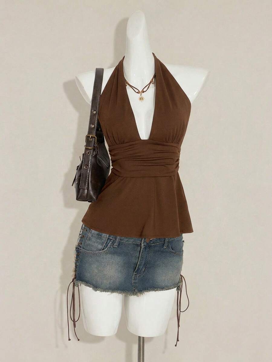 Women's backless halter babydoll tank top featuring a square neckline, slim fit silhouette, and a flared ruffle hem.