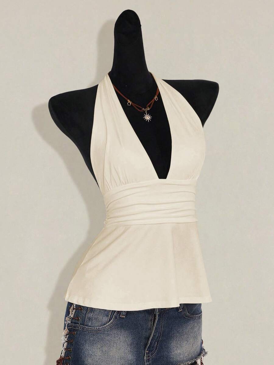 Women's backless halter babydoll tank top featuring a square neckline, slim fit silhouette, and a flared ruffle hem.
