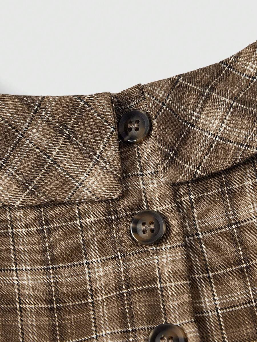 Short sleeve plaid shirt for women featuring a Peter Pan collar with a bow accent, puff sleeves, and a flared hem.