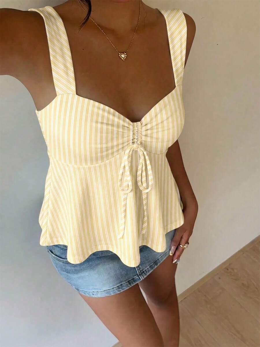 Women's striped camisole tank top with strap neckline, backless knot detail, cold shoulder styling, slim fit, and flared hem for casual vacation or daily wear.