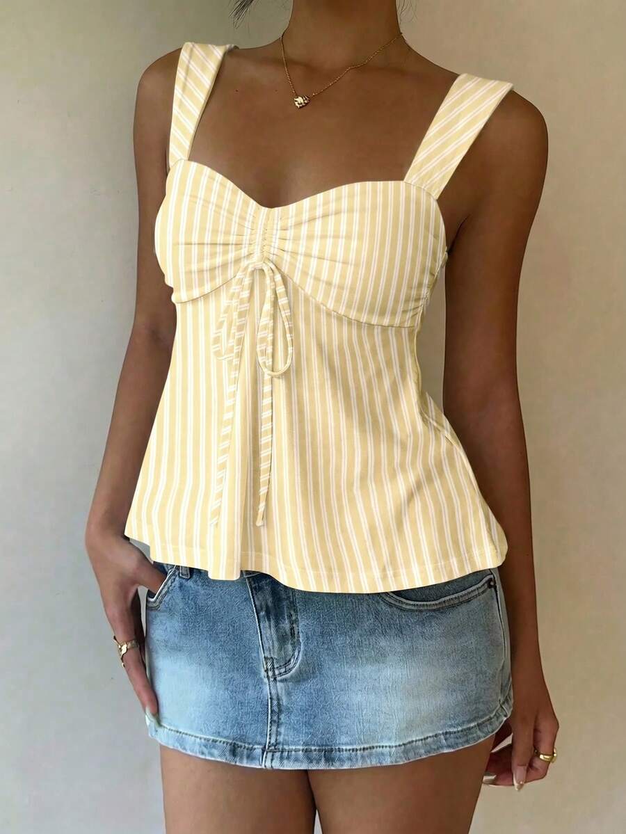Women's striped camisole tank top with strap neckline, backless knot detail, cold shoulder styling, slim fit, and flared hem for casual vacation or daily wear.