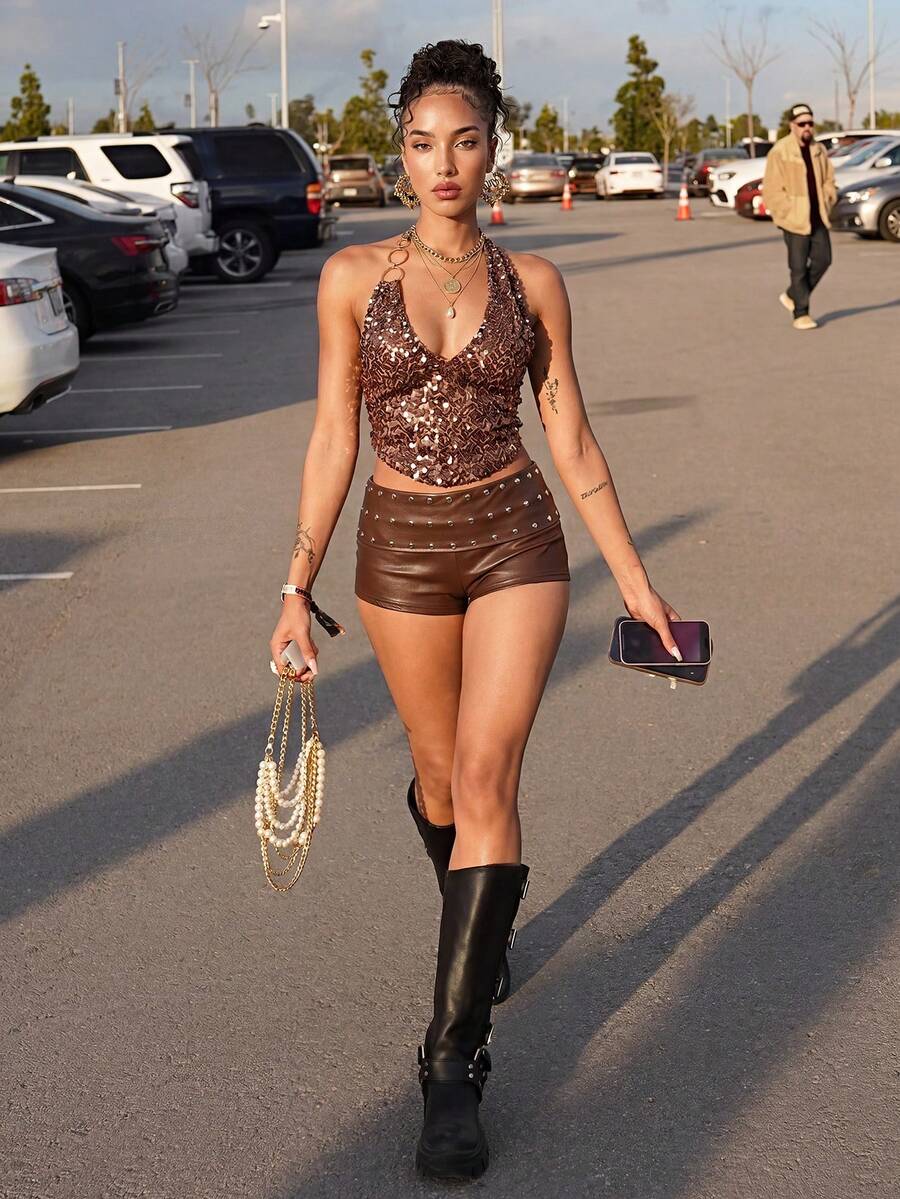 Women's studded PU ultra low waist mini shorts with zipper fly closure, skinny fit, mini length, and plain unlined design.