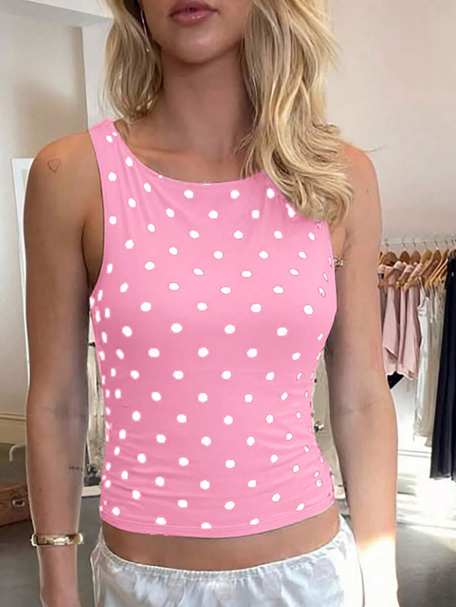 Women's polka dot sleeveless tank top with round neck, ruched rib-knit detail, regular hem, and slim fit casual style