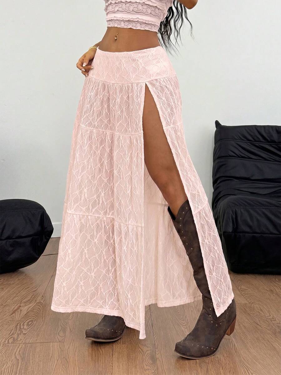 Women's red plaid long skirt featuring a low-rise waist and a side slit in lightweight woven fabric.
