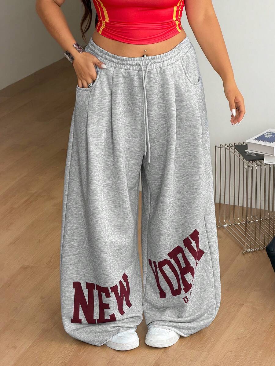 Women's loose wide leg casual sweatpants with an elastic waistband and side pockets