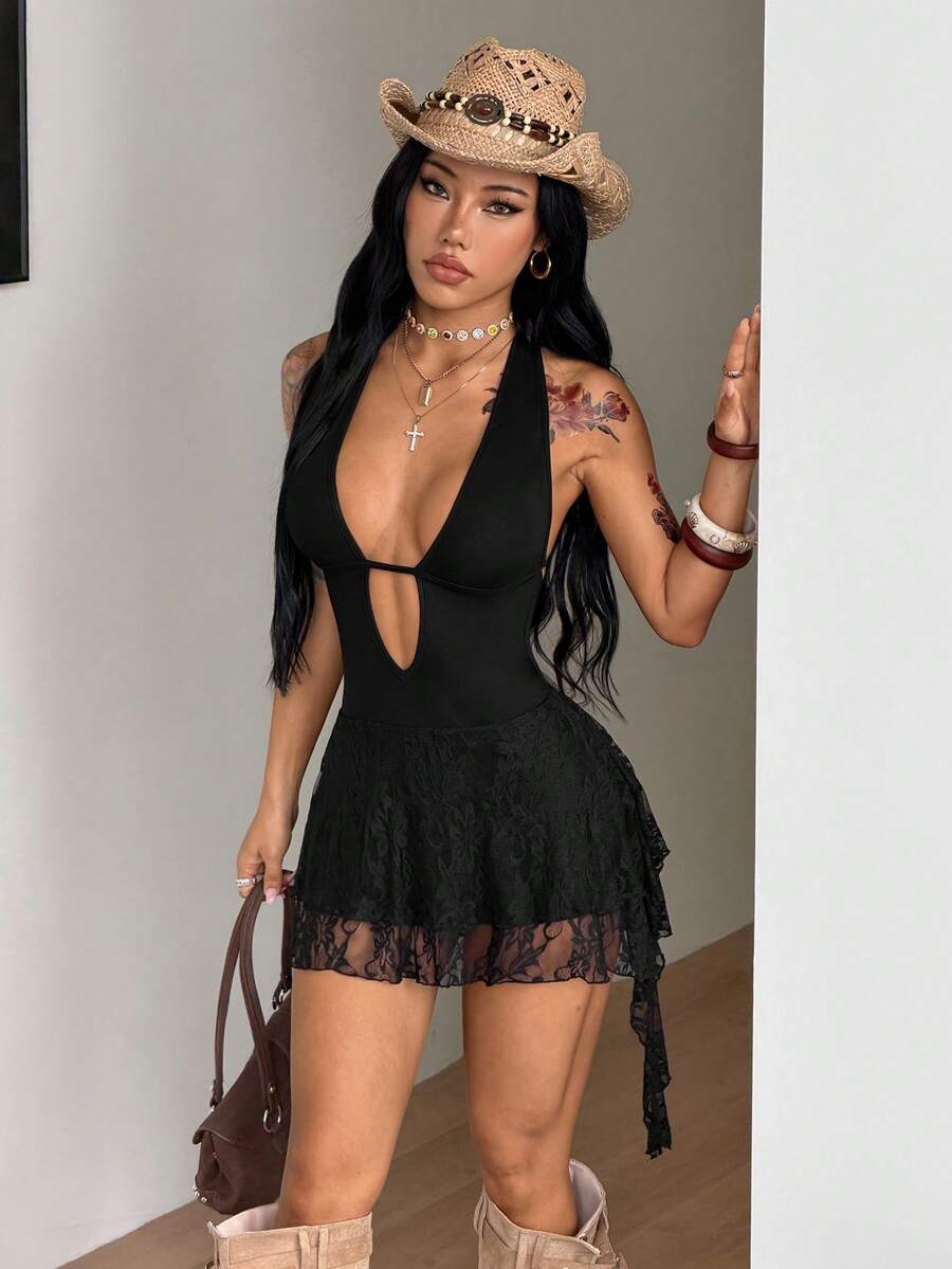 Women's sleeveless backless halter mini dress in coffee brown with a deep v-neckline, tie back detail, and a tiered A-line skirt.