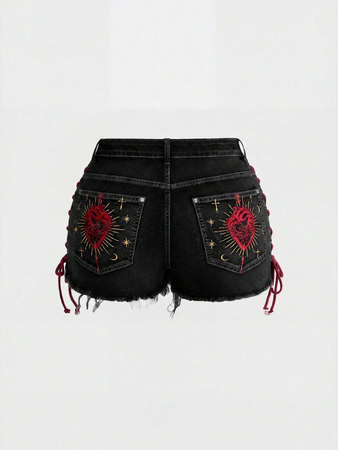 Plus size black gothic mini shorts with heart embroidery, graphic pocket pattern, lace-up detail, raw hem, and zipper fly