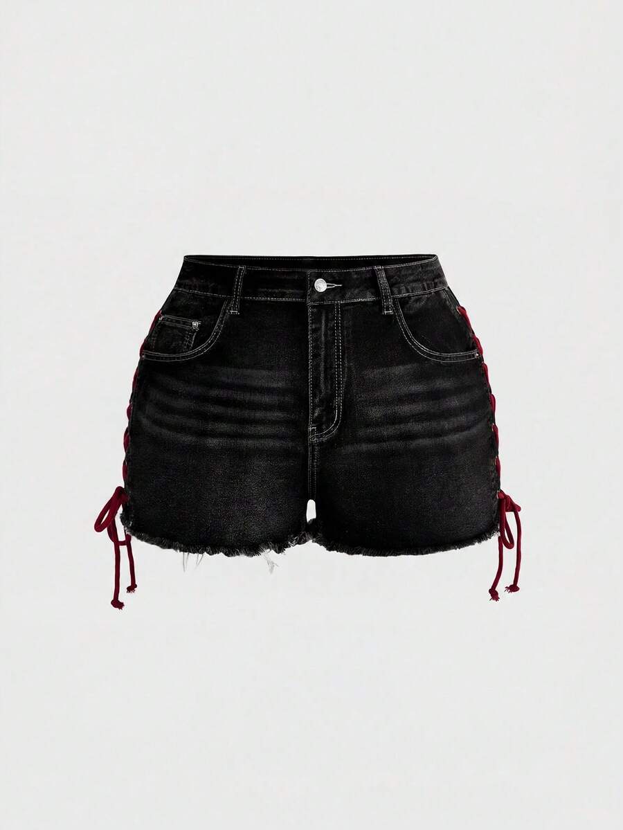 Plus size black gothic mini shorts with heart embroidery, graphic pocket pattern, lace-up detail, raw hem, and zipper fly
