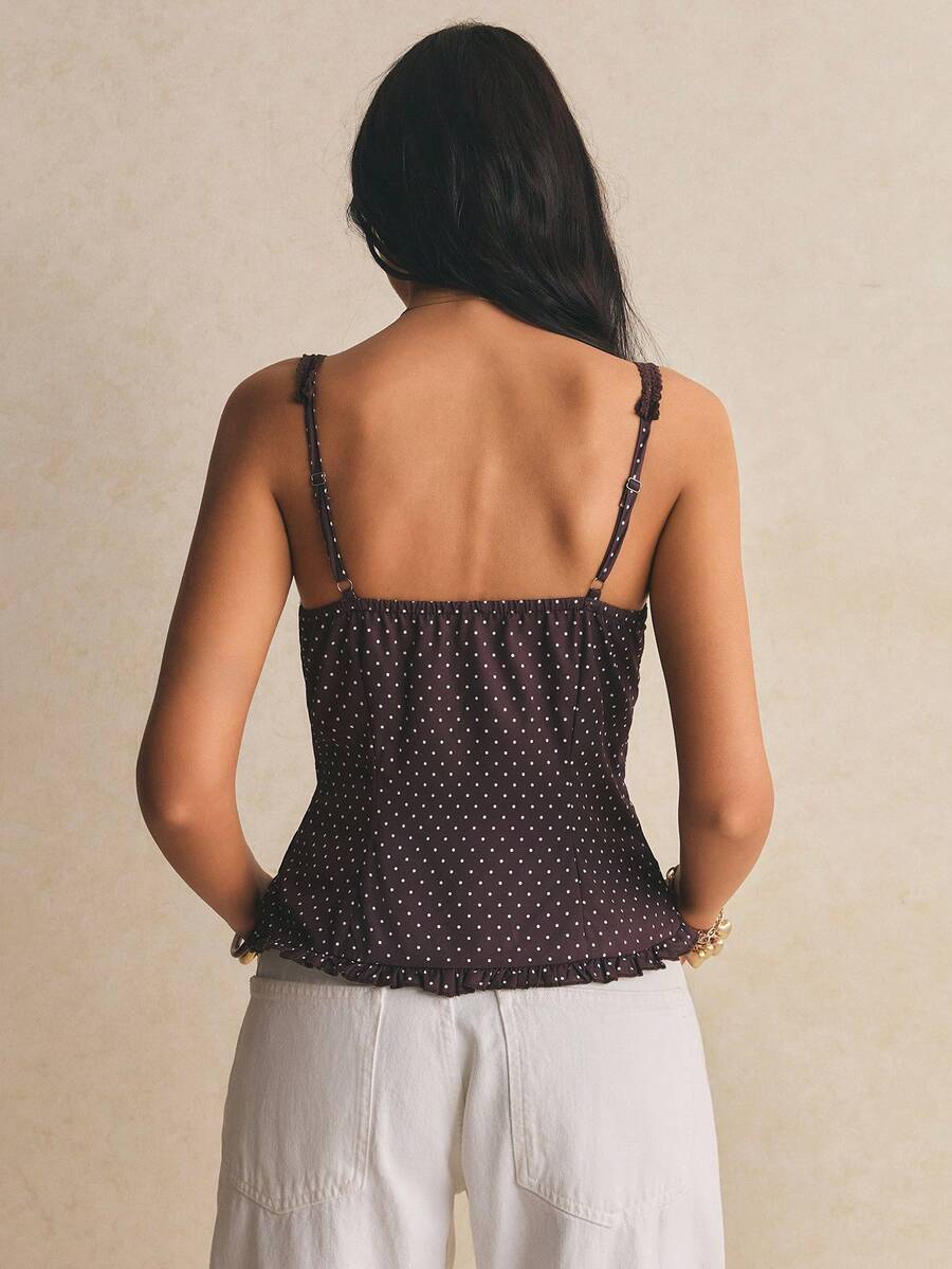 Women's casual ruffle trim wide strap tank top featuring a slim fit, strap neckline, slit hem, and woven fabric design.