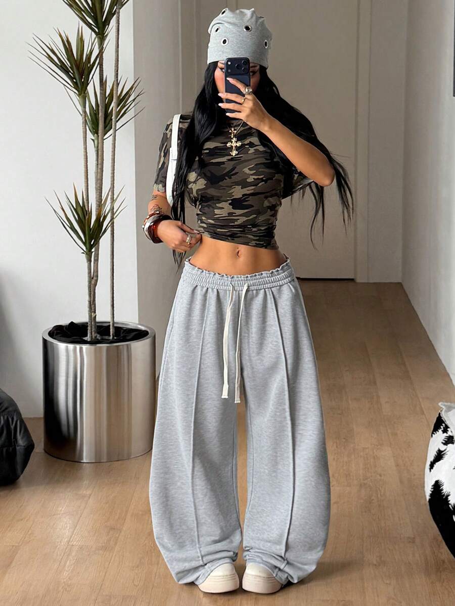 Women's striped straight leg casual trousers with elastic mid waist and side pockets