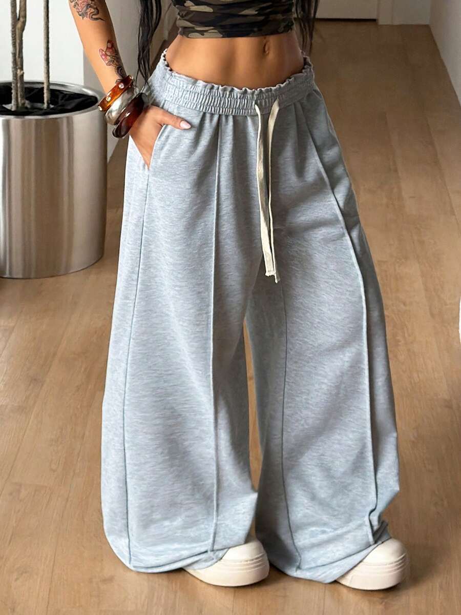 Women's striped straight leg casual trousers with elastic mid waist and side pockets