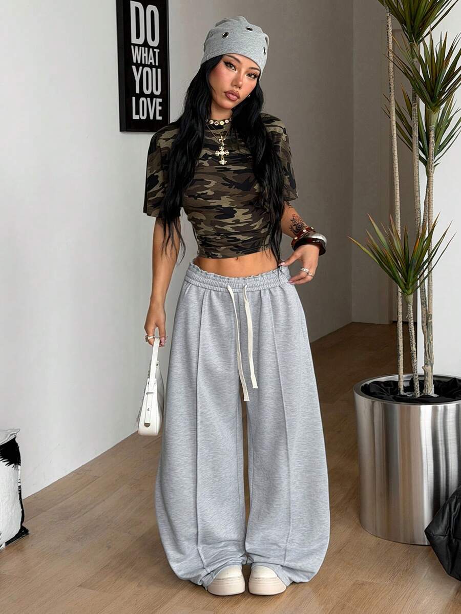 Women's striped straight leg casual trousers with elastic mid waist and side pockets