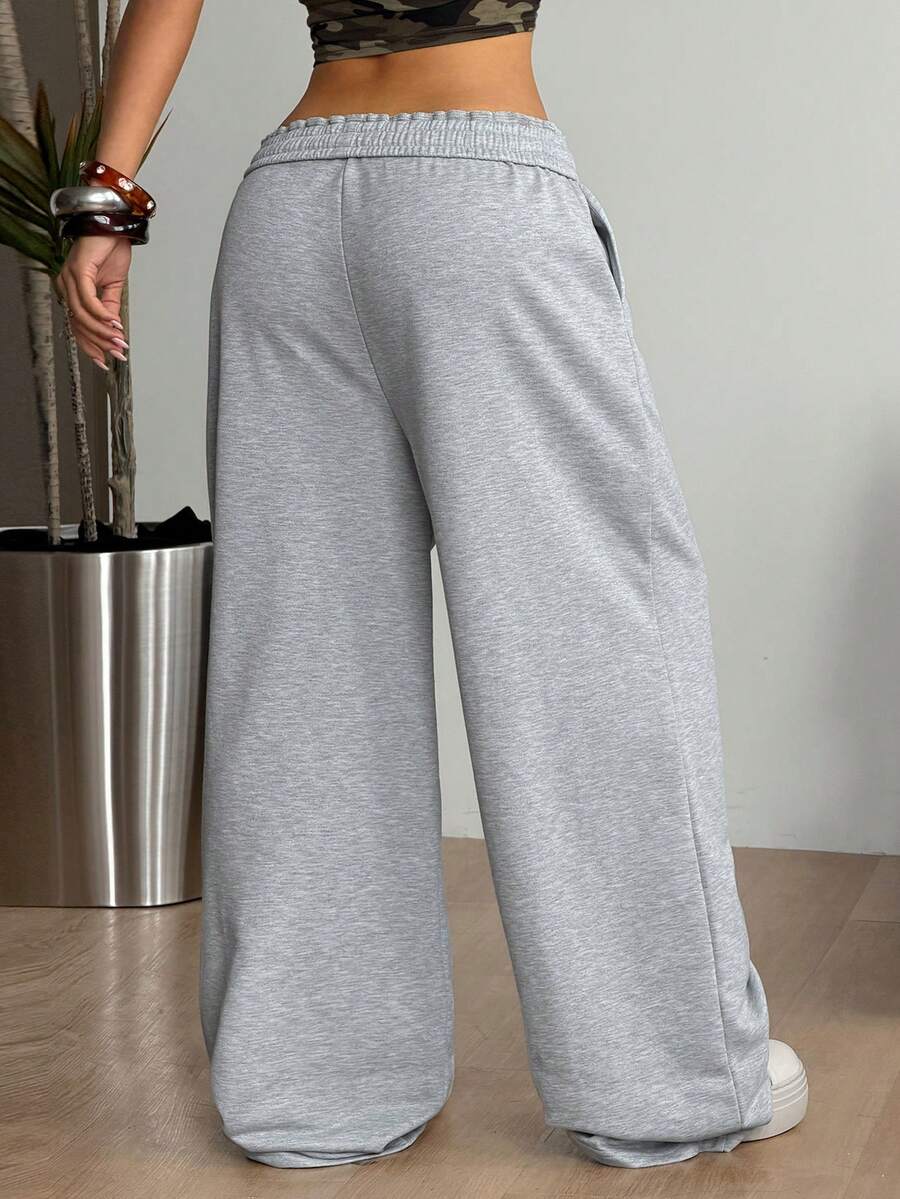 Women's striped straight leg casual trousers with elastic mid waist and side pockets
