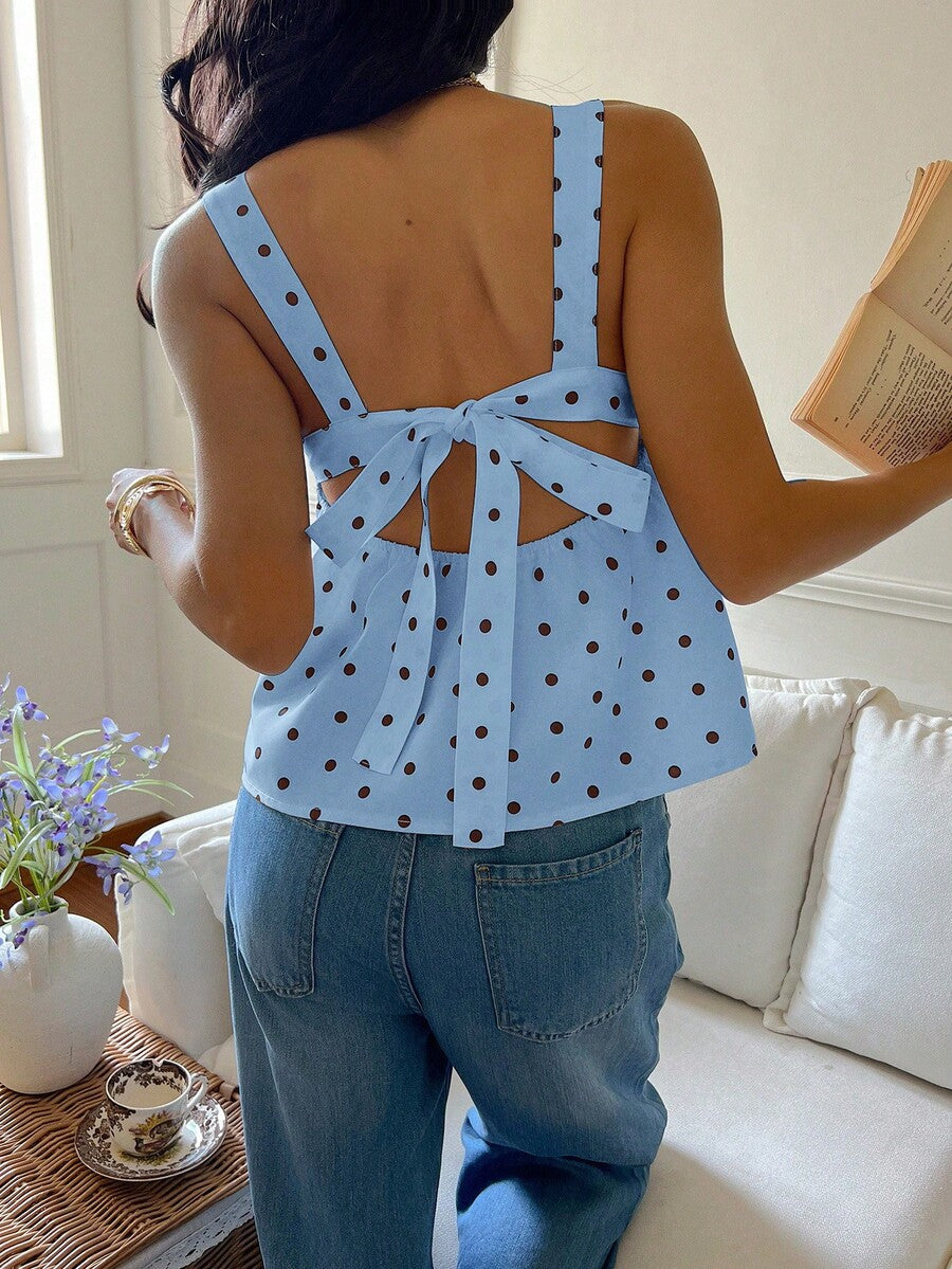 Women's casual polka dot tank top with tie-front knot, strap neckline, backless design, and ruffle flared hem