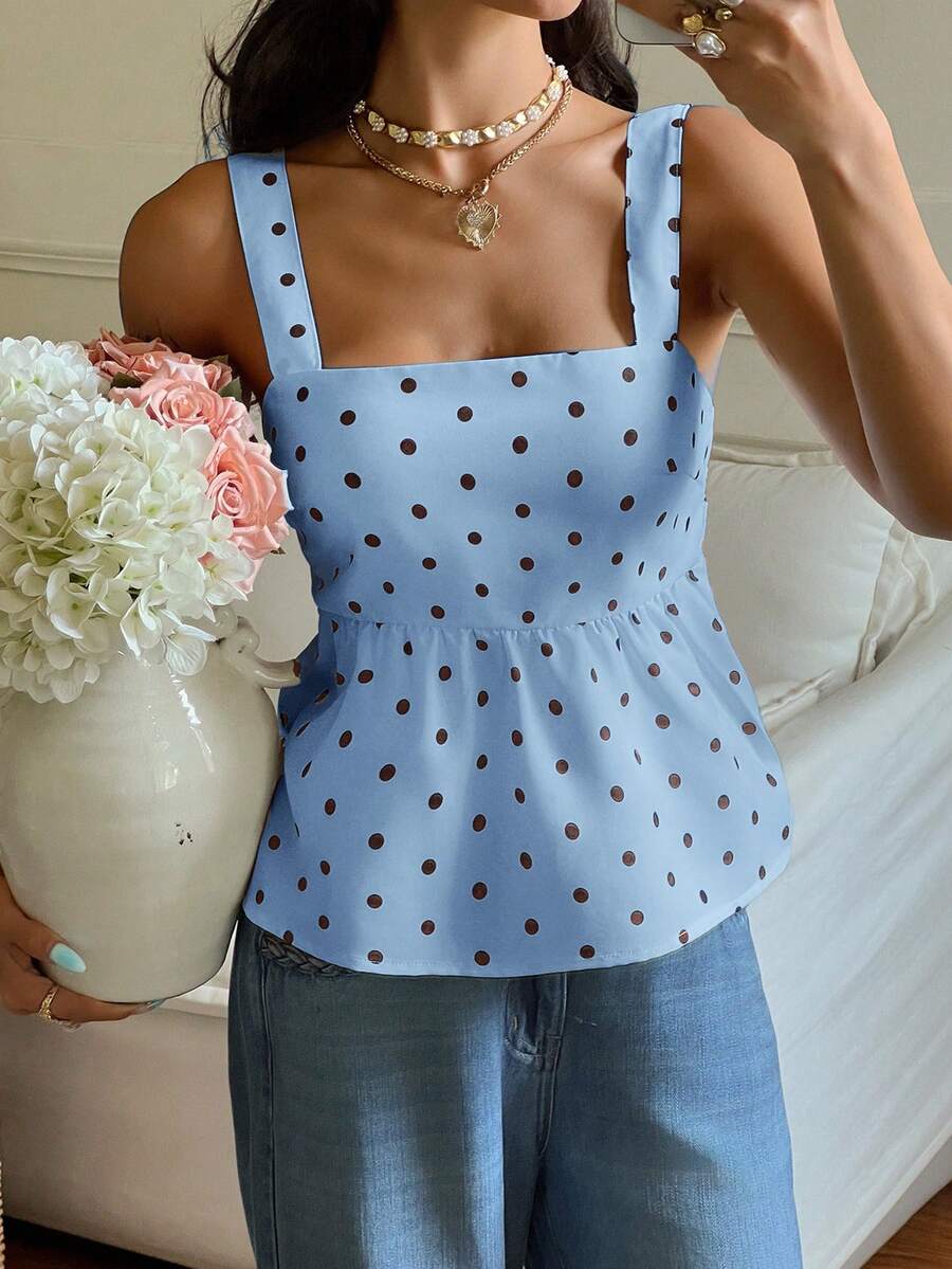 Women's casual polka dot tank top with tie-front knot, strap neckline, backless design, and ruffle flared hem