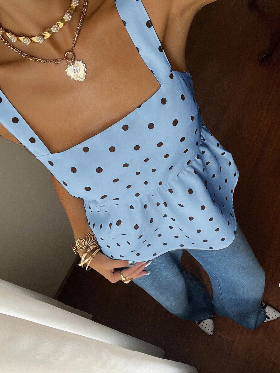 Women's casual polka dot tank top with tie-front knot, strap neckline, backless design, and ruffle flared hem